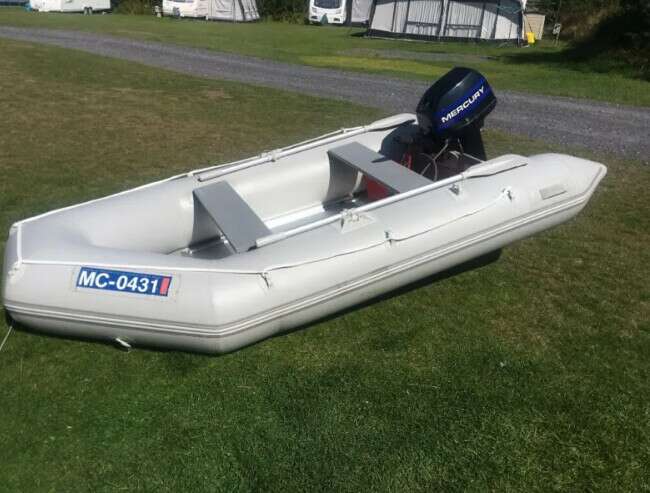 15’ Rib Boat plus 7HP Mercury Engine