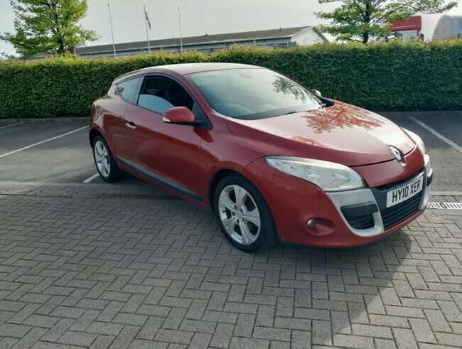 2010 Renault MEGANE Coupe, a manual two-door vehicle with a 1998 cc engine.