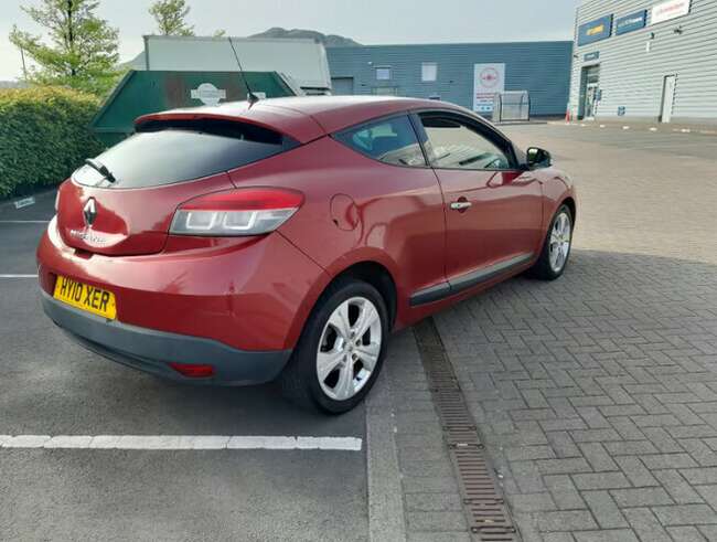 2010 Renault MEGANE Coupe, a manual two-door vehicle with a 1998 cc engine.